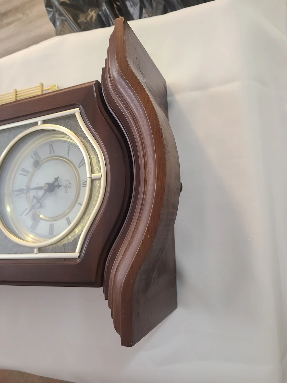 Elgin 31 Day Wooden Wall Chime Clock with Gold Accents - Brown